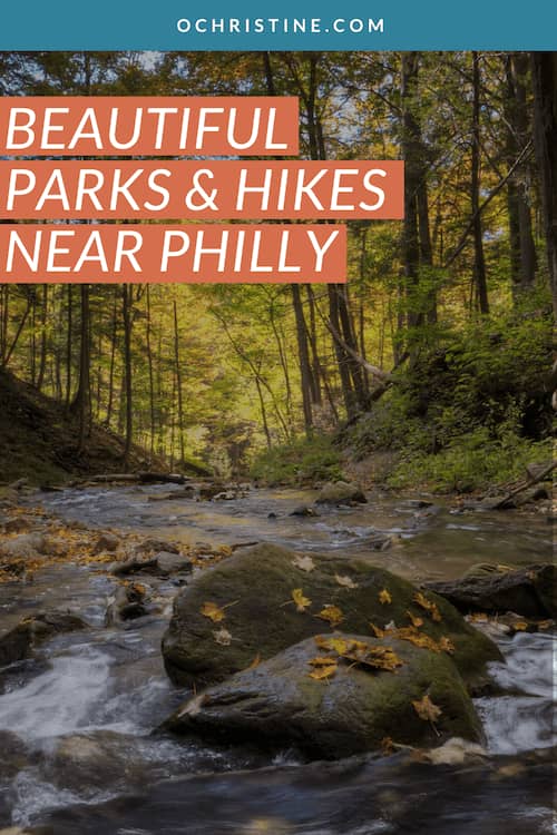 up close view of a stream in the woods with text overlay that says beautiful parks and hikes near Philadelphia
