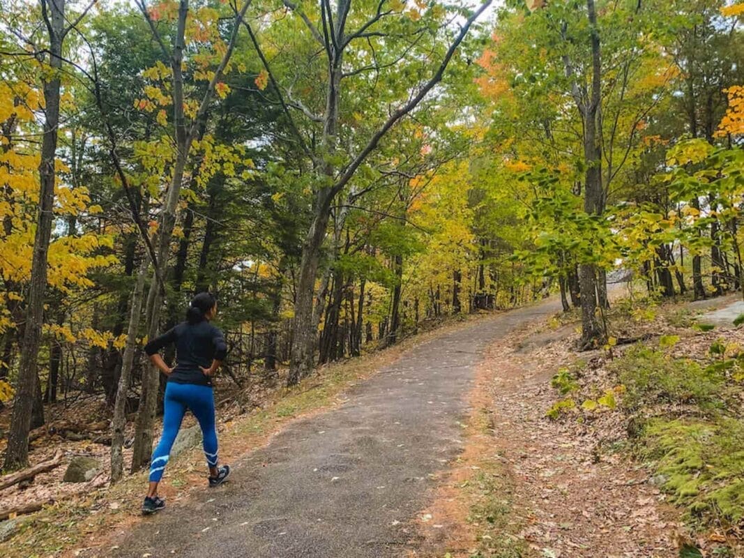 woman hiking during autumn