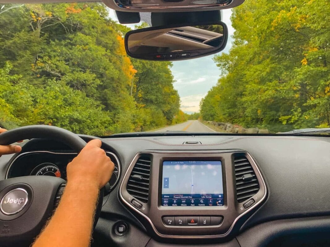 driver perspective inside jeep compass vehicle on a road trip