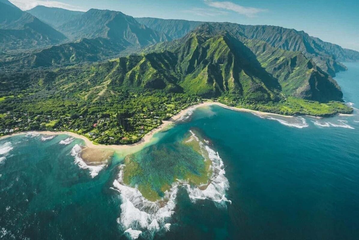 aerial drone view of the kauai coastline and mountains