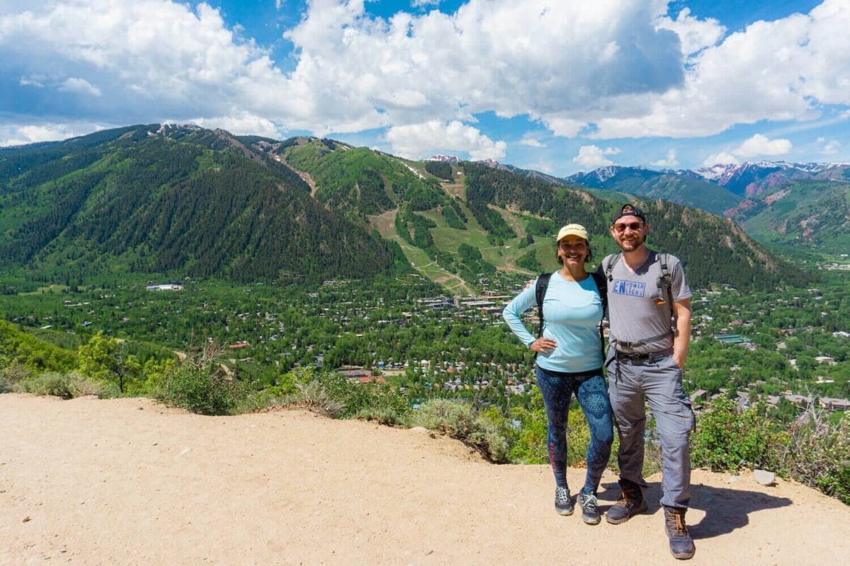 couple hikers on trail near the top of smuggler's road hike