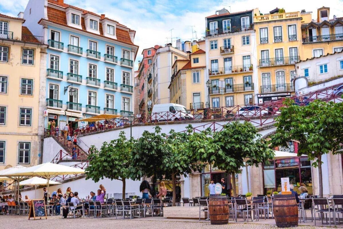 outside dining and colorful buildings in Lisbon