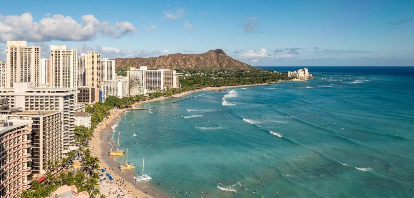 aerial drone view of Waikiki beach and resort hotels