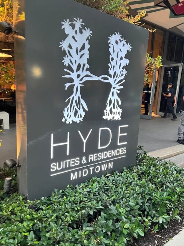 The hotel sign says Hyde Suites and Residences Midtown